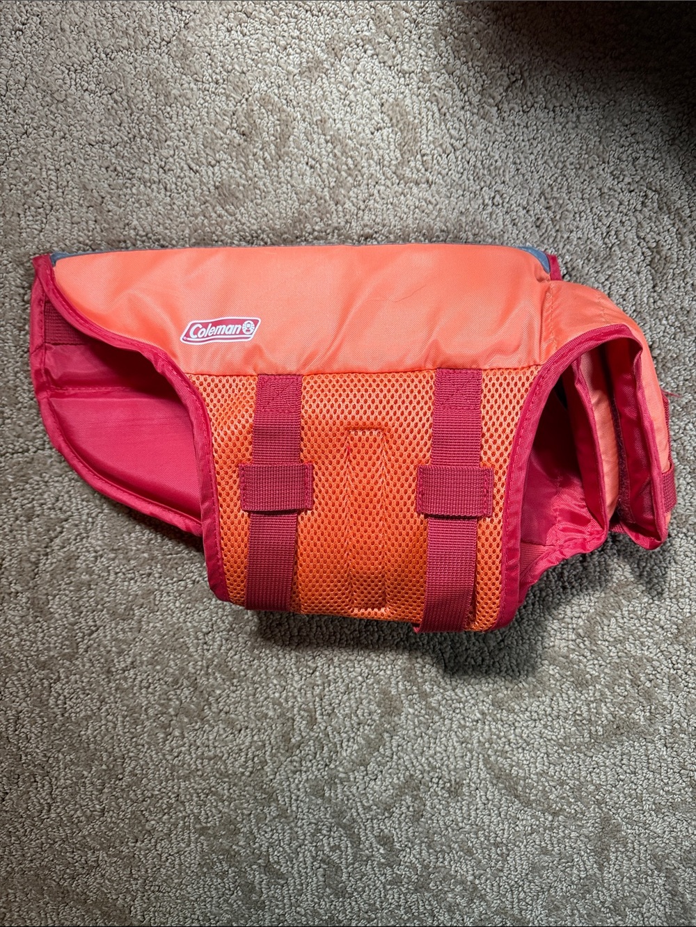 Coleman DOG Orange/Red Swim Vest
Size Small.